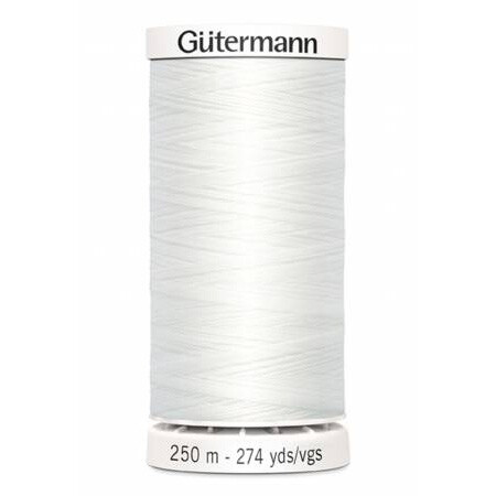 spool of gutermann thread, color white