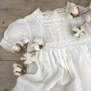 white cotton heirloom dress with stems of cotton