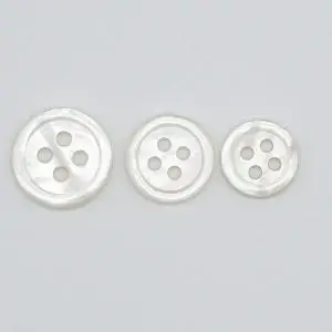 mother of pearl buttons in white product photo